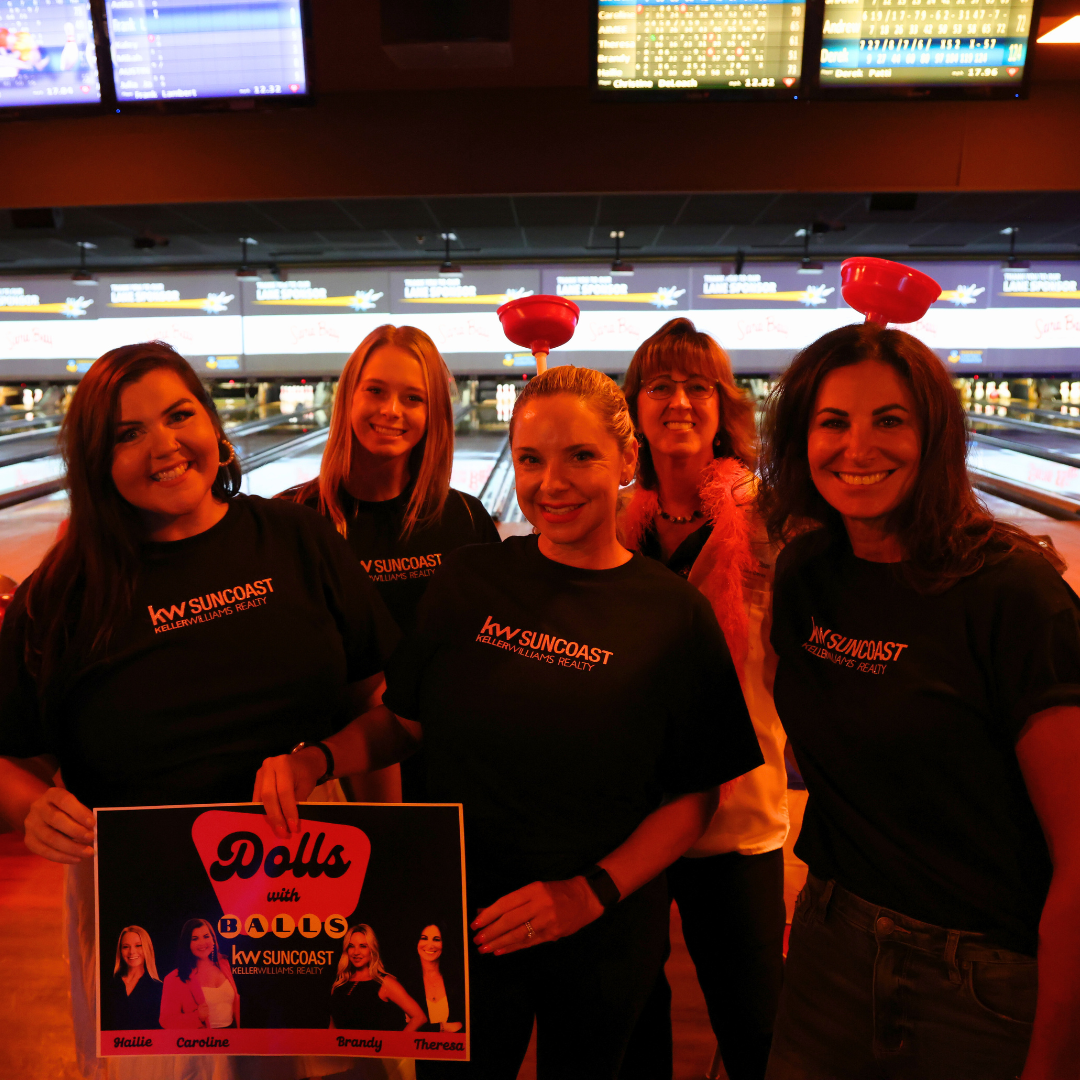 KW Suncoast&rsquo;s &lsquo;Dolls with Balls&rsquo; team celebrates winning the Most Striking Squad award at the 2025 Pins & Purpose event.