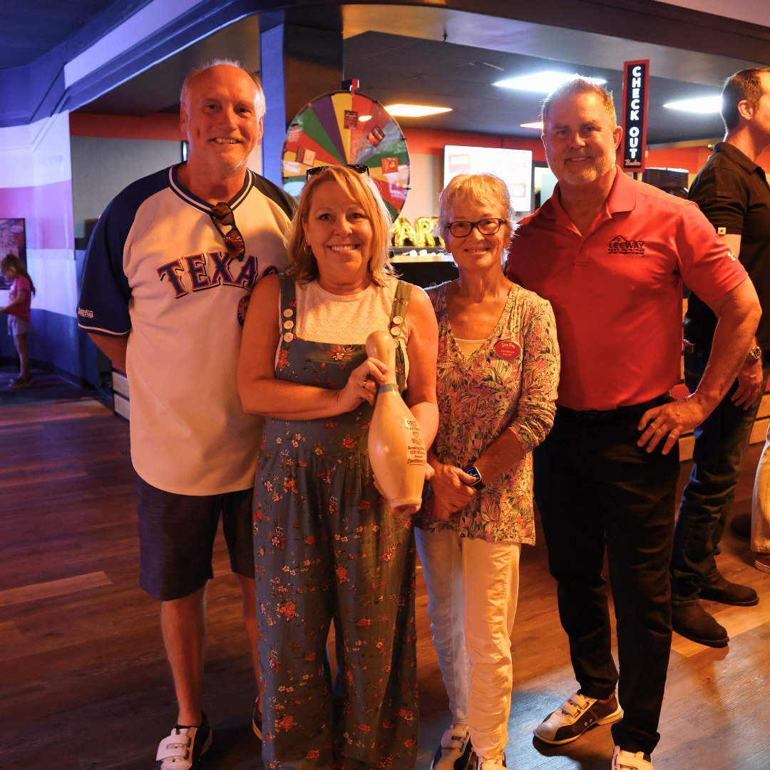 Team Sara Bay smiles and poses together after winning the 2025 Pins & Purpose Trophy.