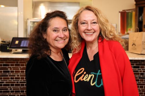 Two Global Recognition Award Winners Smiling.