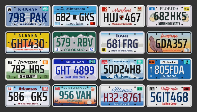A wall of license plates from different states